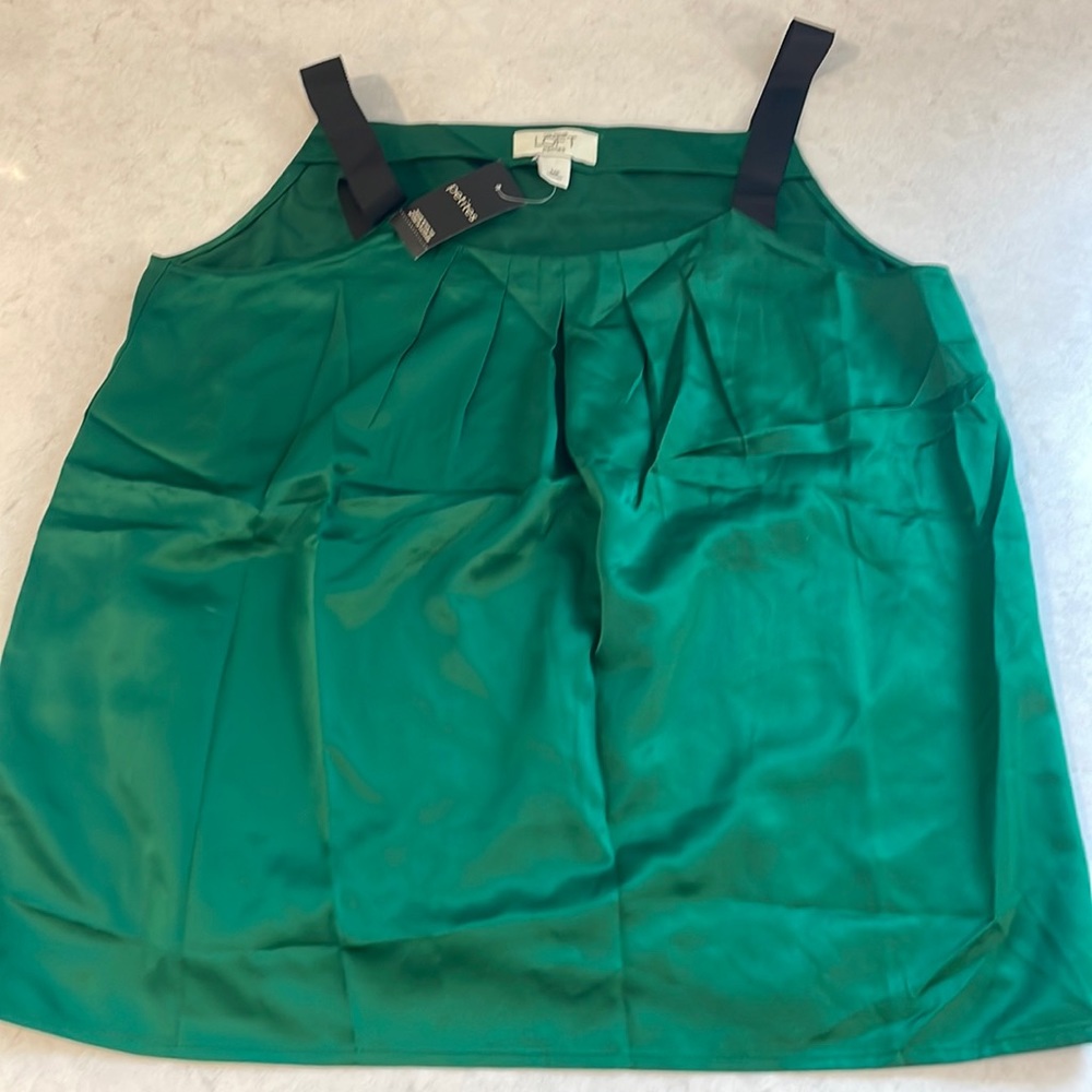 Green silky tank with black straps